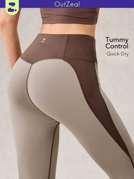 A close-up, high-contrast product shot focusing on the fit and texture of tummy control leggings to highlight specific functional benefits.